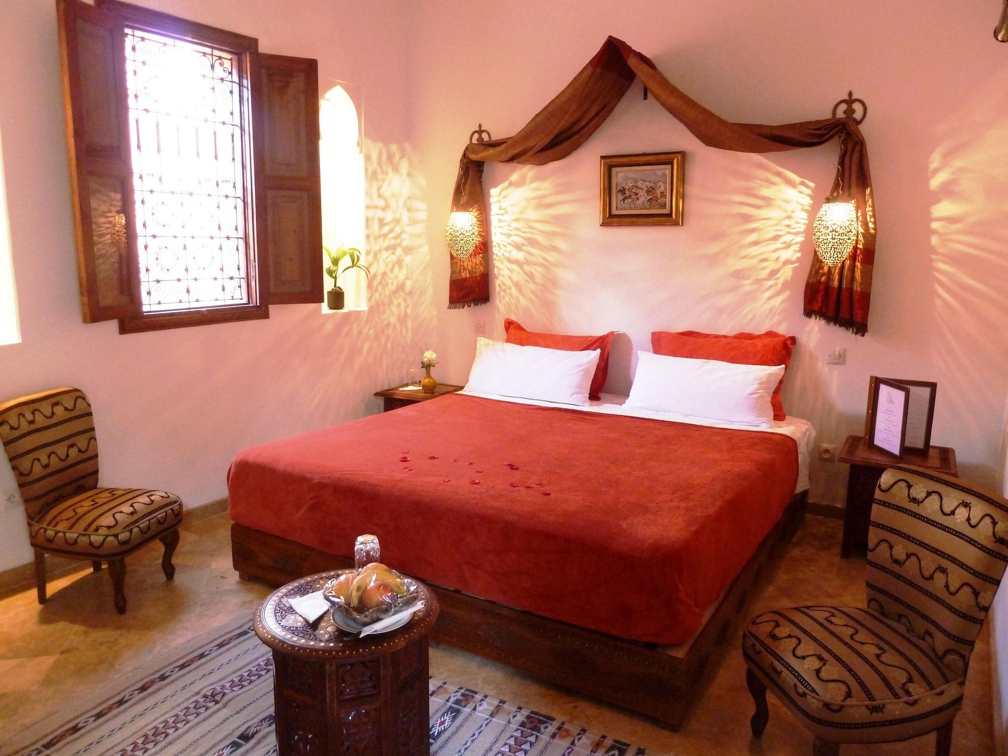 Riad Viva Marraquexe Exterior foto A bedroom in a Moroccan riad