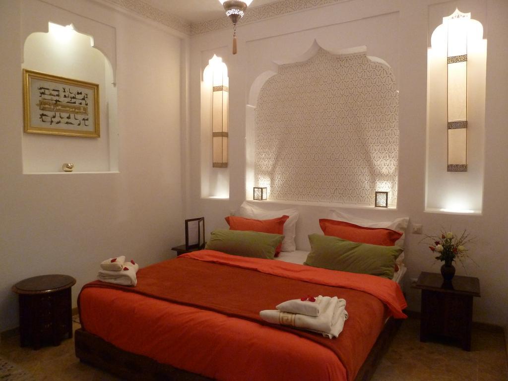 Riad Viva Marraquexe Exterior foto A bedroom in a hotel in Morocco